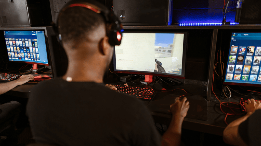 a person playing a video game on a computer monitor