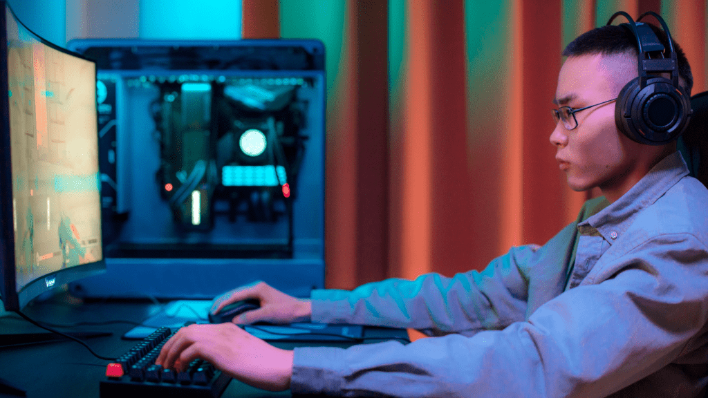 A person wearing headphones is playing a video game
