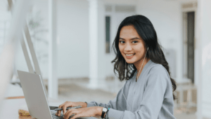 women working on a laptop