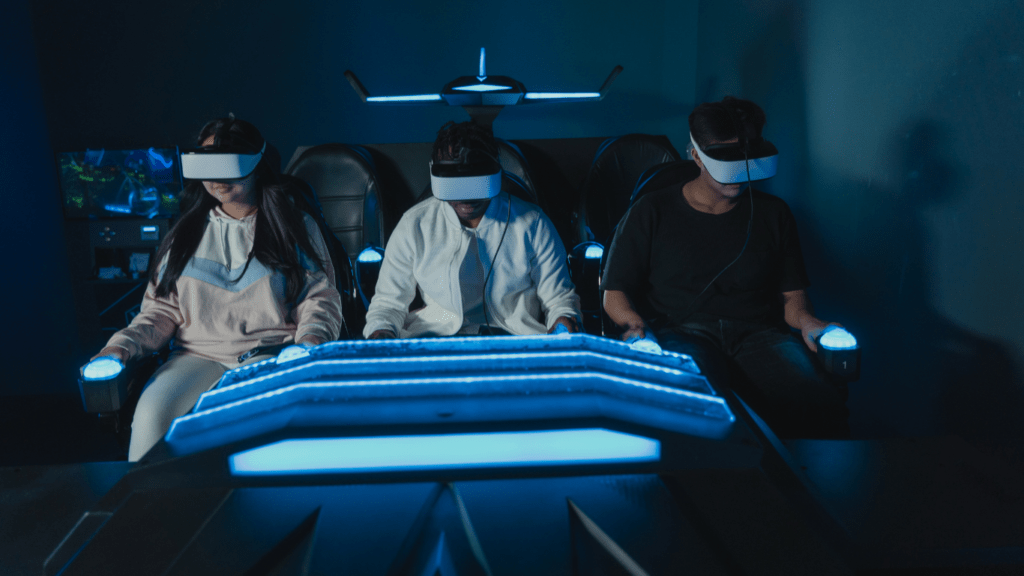 a group of people wearing virtual reality glasses in a dark room