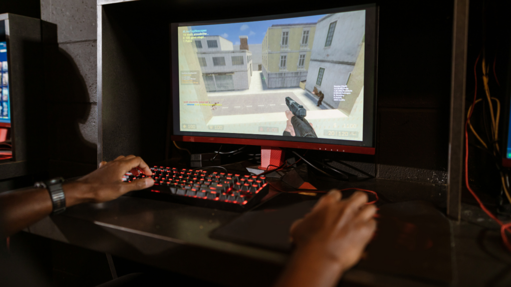 a person playing a video game on a computer monitor