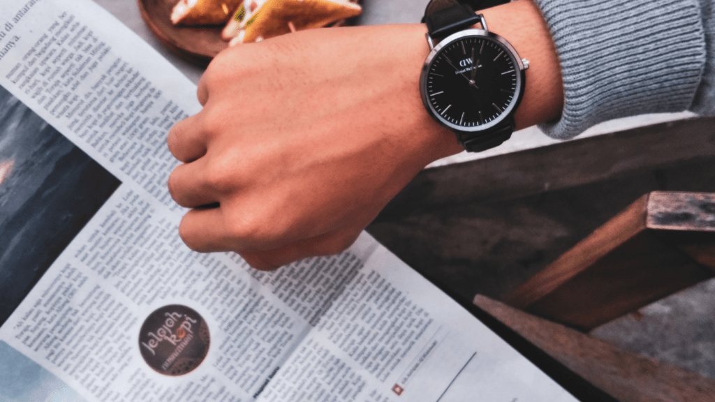 a person with a watch on their wrist