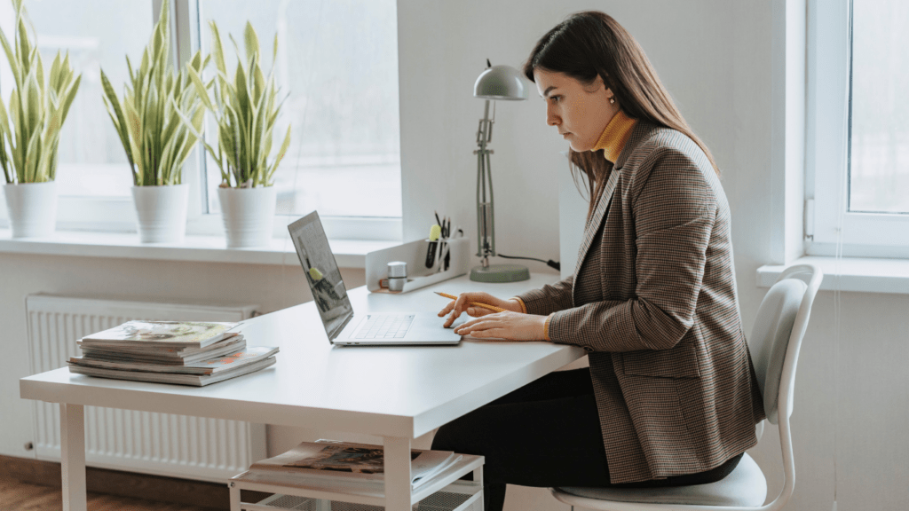 women working on a laptop